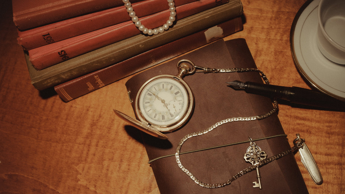 fine stationery notebooks stacked with fountain pen